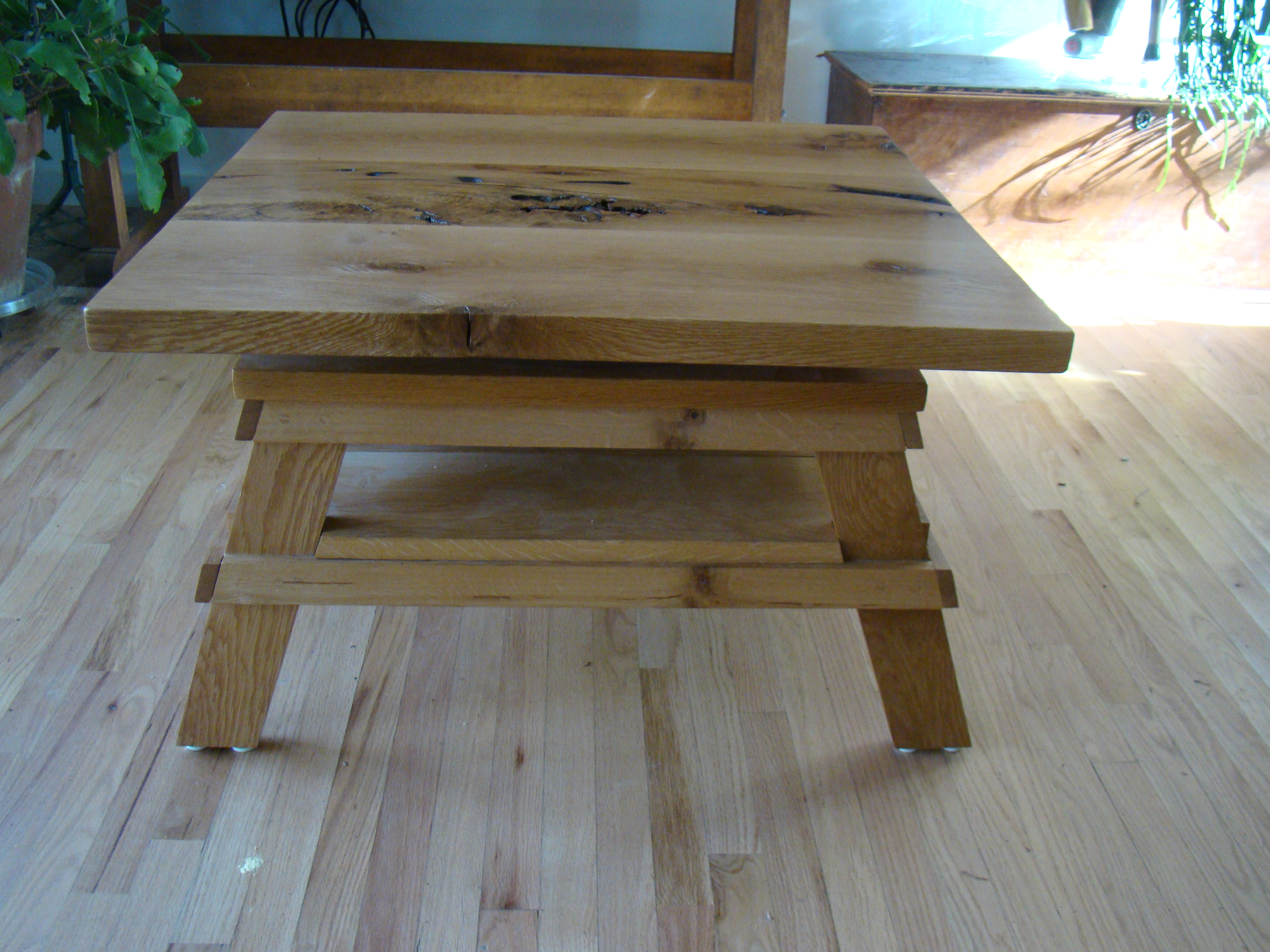 Oak adjustable height table by No Walls Studio